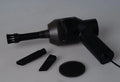 Black desktop mini vacuum cleaner with USB cable and dust collection chamber for keyboard and small space cleaning