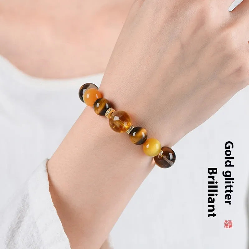 Women's natural yellow tower 10mm artificial crystal string bead bracelet on a white background.