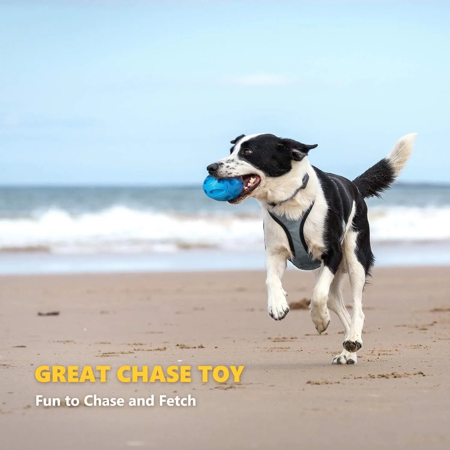 Durable natural rubber squeaky chew ball dog toy with surface grooves for medium and large breeds