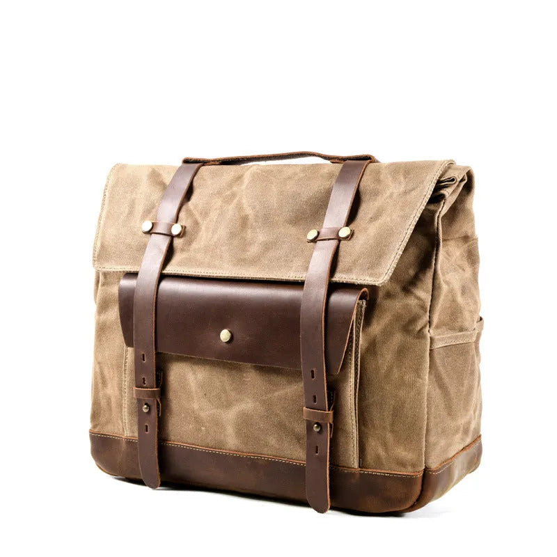 Retro style cotton motorcycle messenger bag in army green with rivet details.
