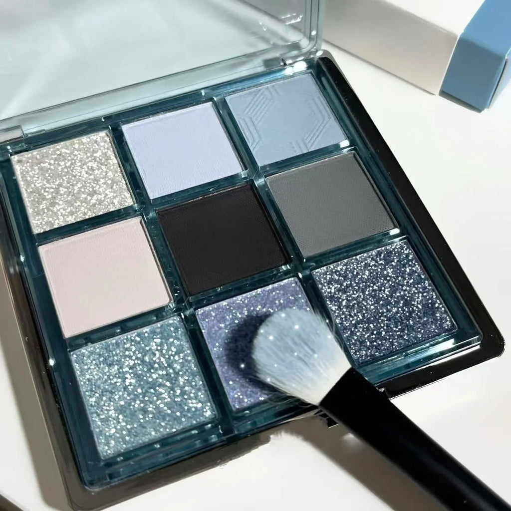MUGELEEN nine-colour eye shadow palette showing matte, shimmer and diamond debris textures in cool tones