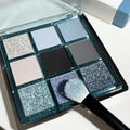 MUGELEEN nine-colour eye shadow palette showing matte, shimmer and diamond debris textures in cool tones