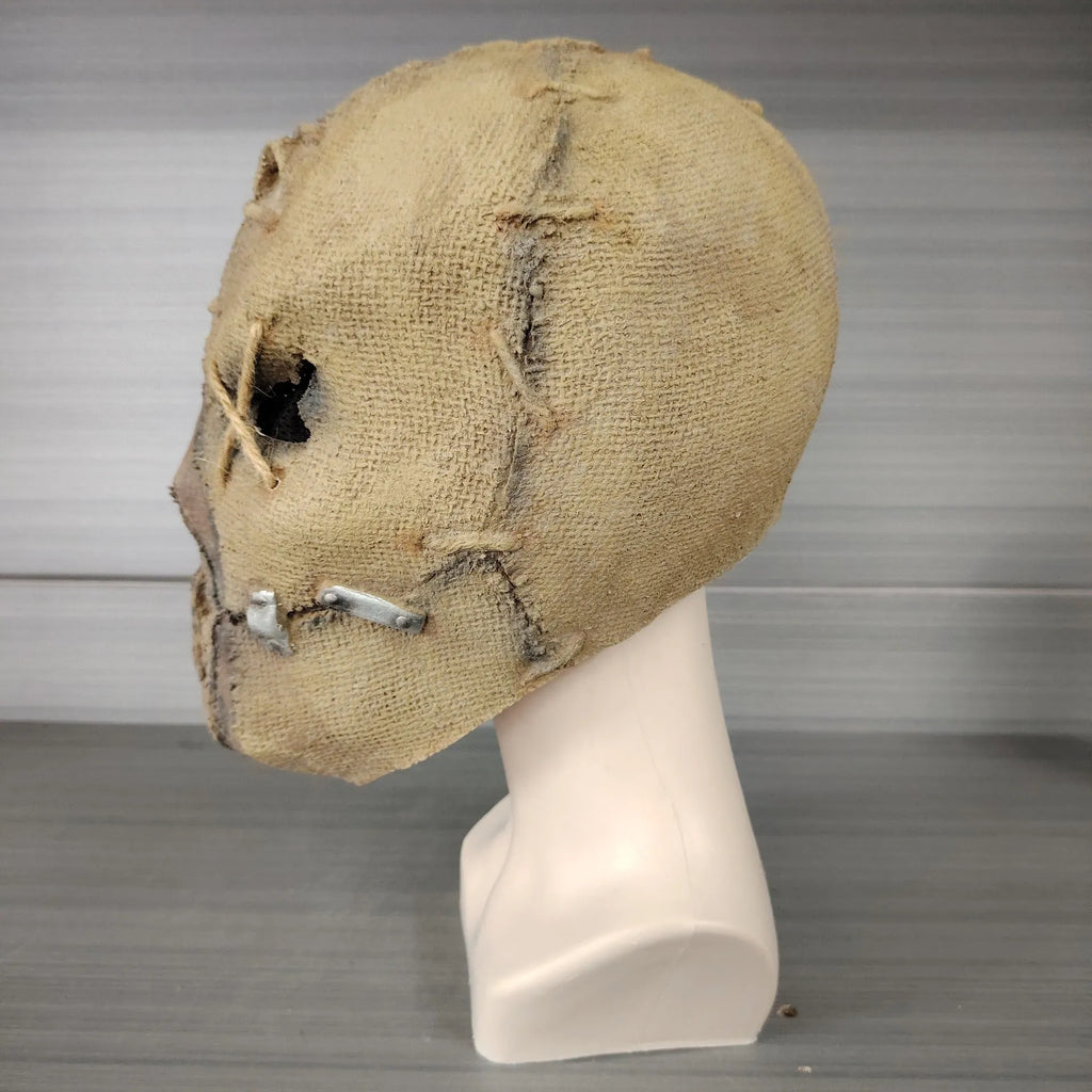 Latex scar skull mask head cover for Halloween and horror costumes.