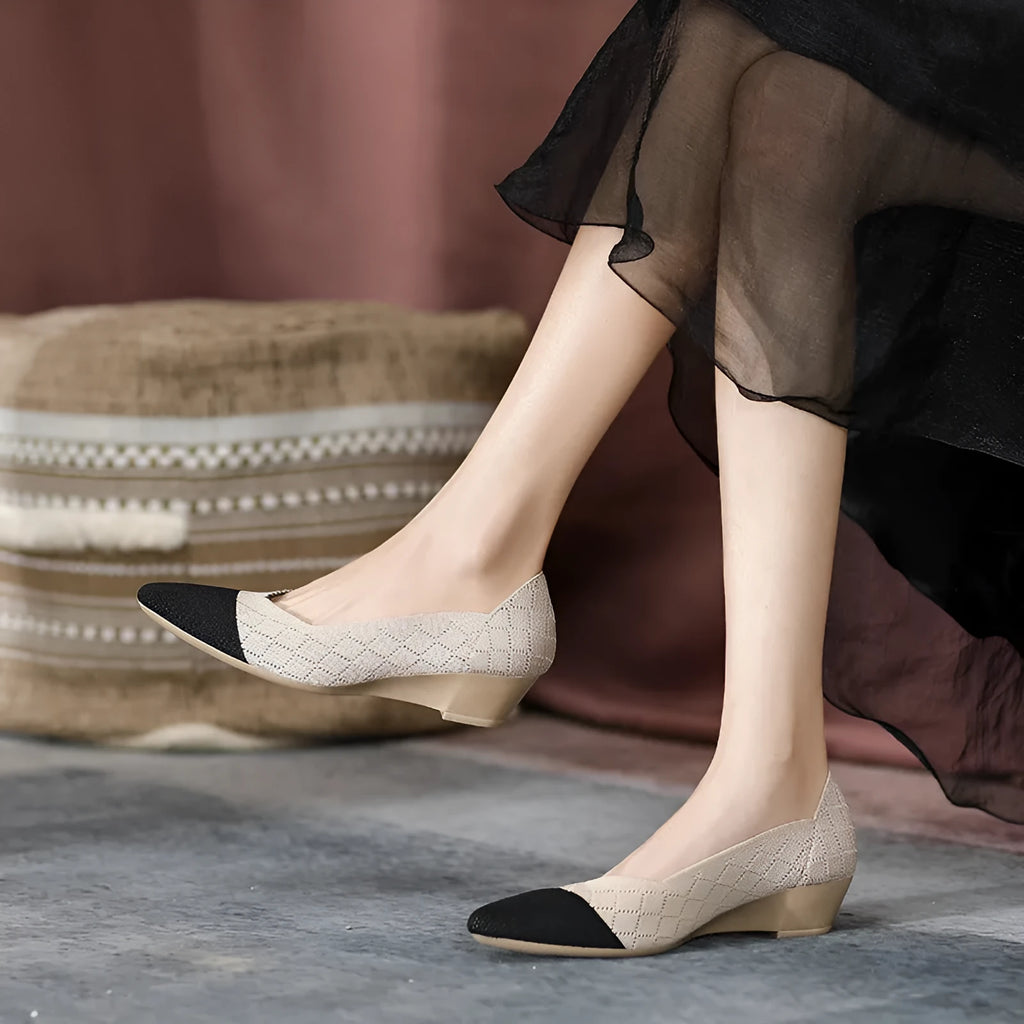 Women's beige Flyknit casual wedge shoes with a mid heel and shallow mouth on a white background.