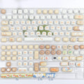 Steamed bread cat theme PBT key cap set with 26 keys for mechanical keyboard customisation