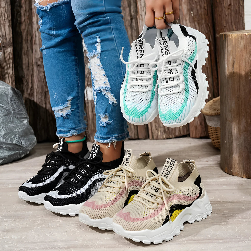 Women's casual sports shoes with mesh upper and lace-up front in multiple colour options