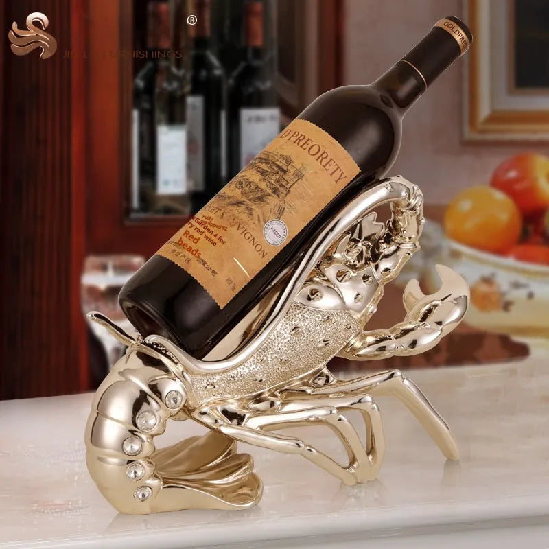 Decorative lobster-shaped wine rack ornament in rose gold or silver resin and plastic on a tabletop.