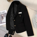 Women's black short suit coat with loose fit and regular sleeves on hanger