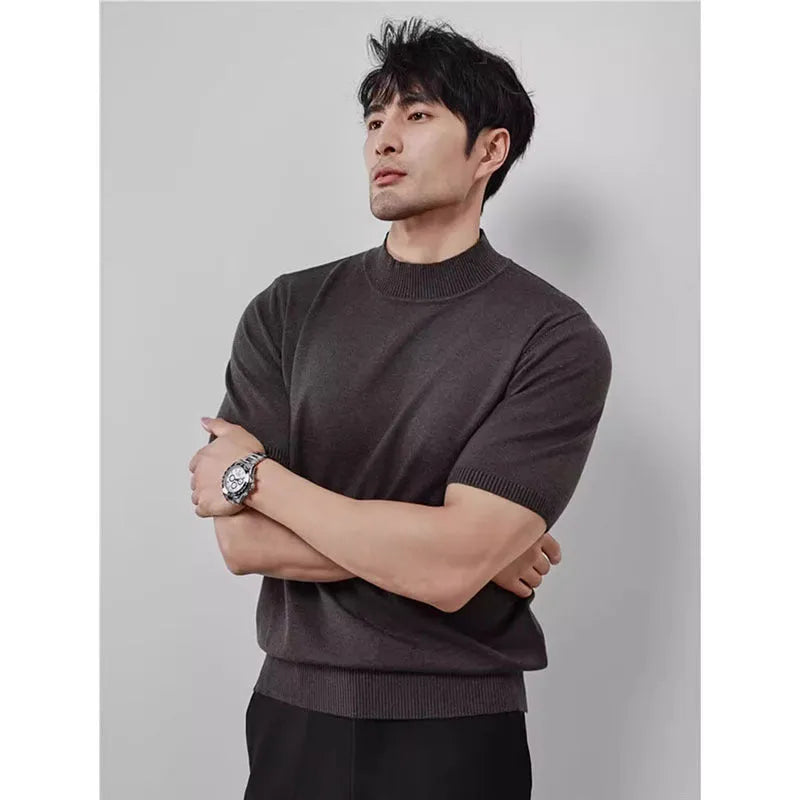 Men's ice silk half turtleneck solid colour slim fit pullover in green on a plain background