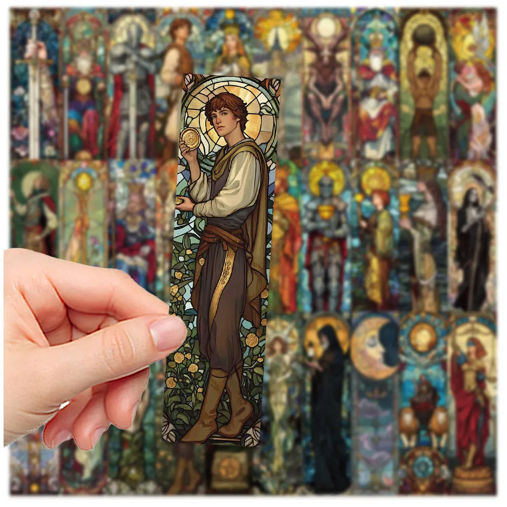 Set of 30 colourful hand-painted tarot card design paper bookmarks laid out flat.