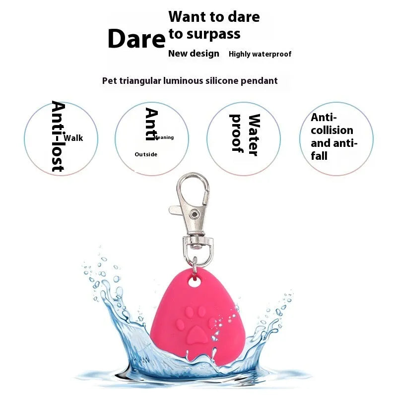 Silicone triangle-shaped light-up pendant for pet costumes in red, pink, blue, green, and yellow colours.