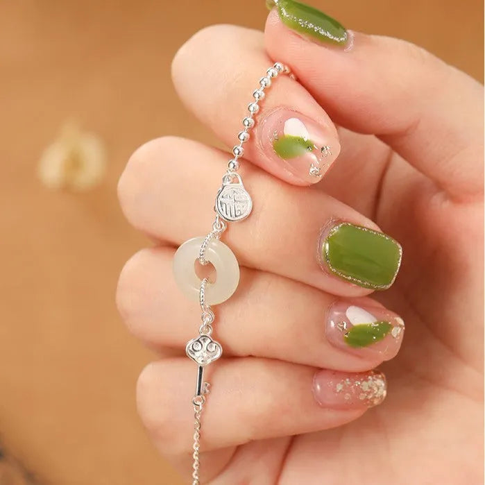 Women's 925 silver Hetian jade bracelet with geometry shape and Ruyi Xiaofu design
