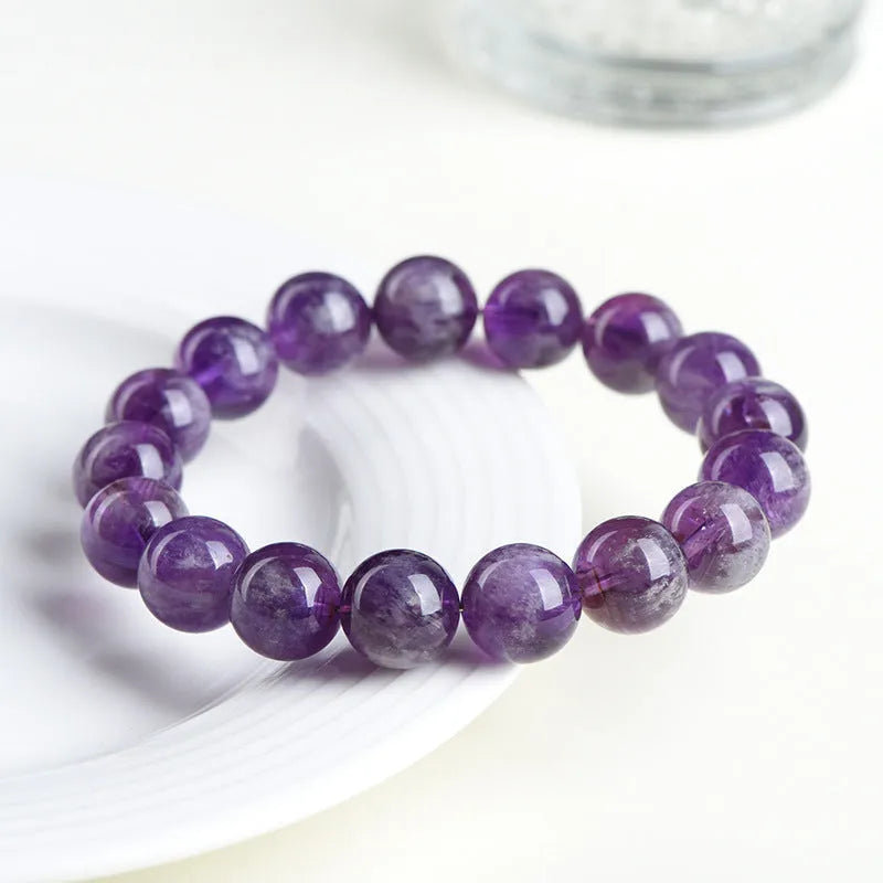 Natural feather amethyst bracelet in Snow Mountain Purple with scattered beads and Ruyi symbol