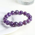 Natural feather amethyst bracelet in Snow Mountain Purple with scattered beads and Ruyi symbol