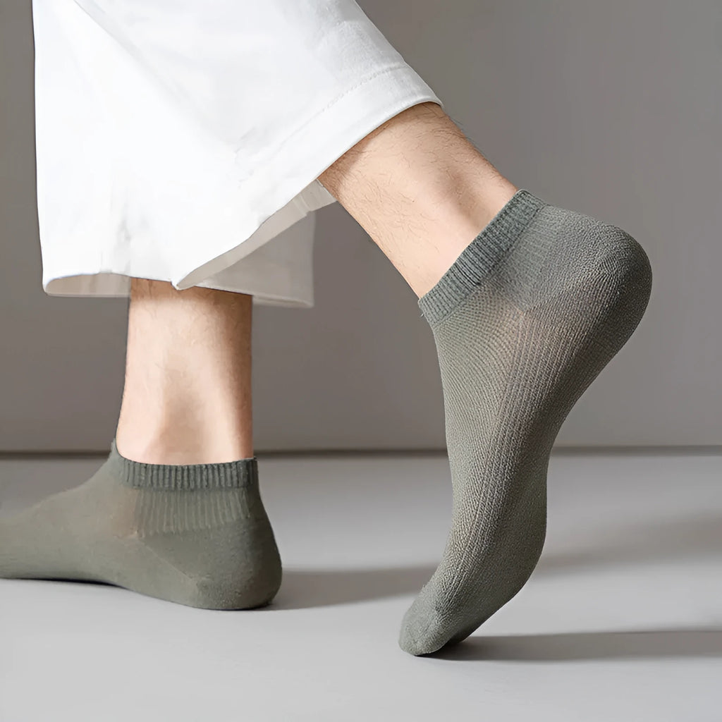 Solid colour low-cut polyester boat socks for men in a free size, shown in one of six available colour options.