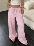 Women's black wide-leg trousers with lace-up waist detailing and mid-rise fit