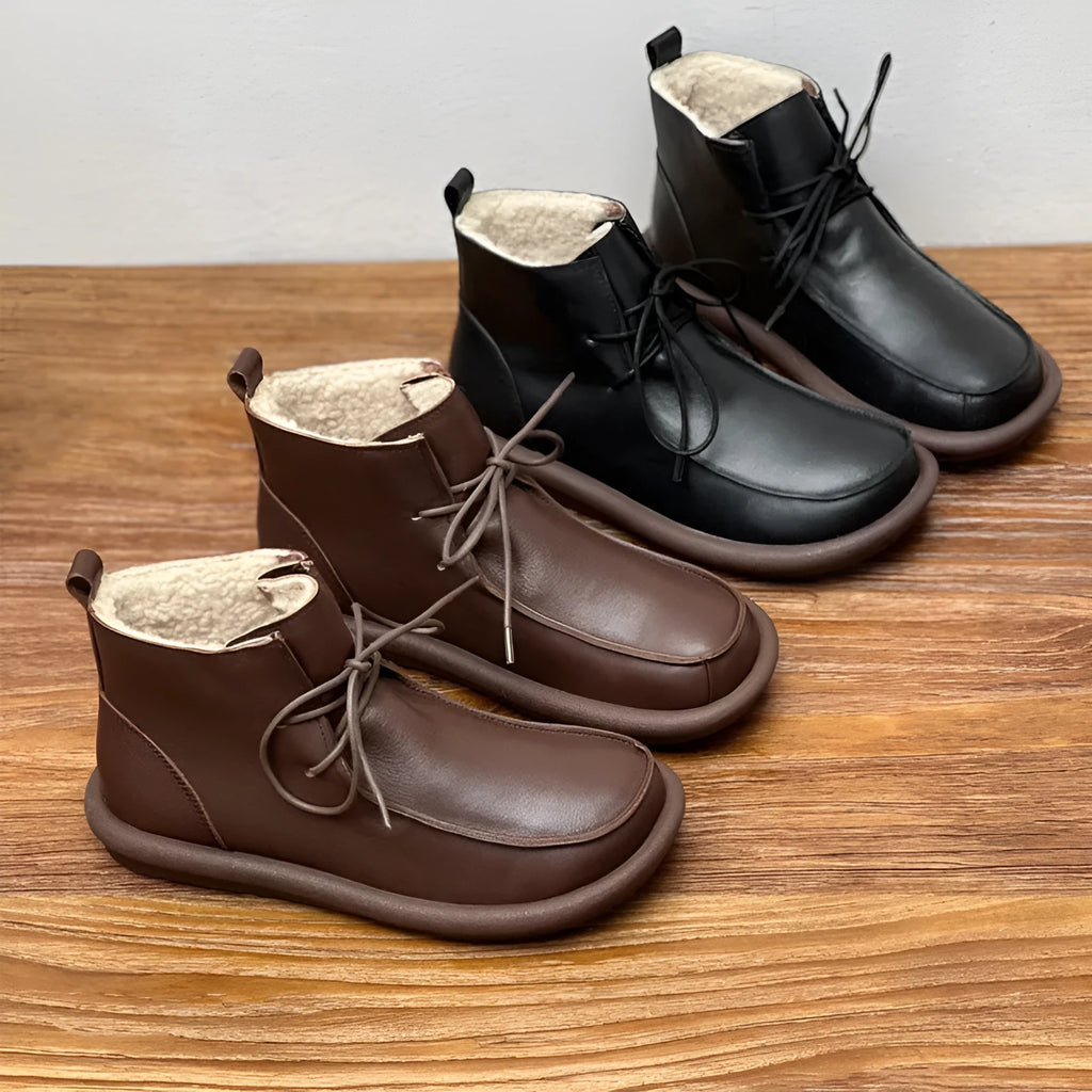 Women's cowhide casual boots with round toe and flat heel in black colour option