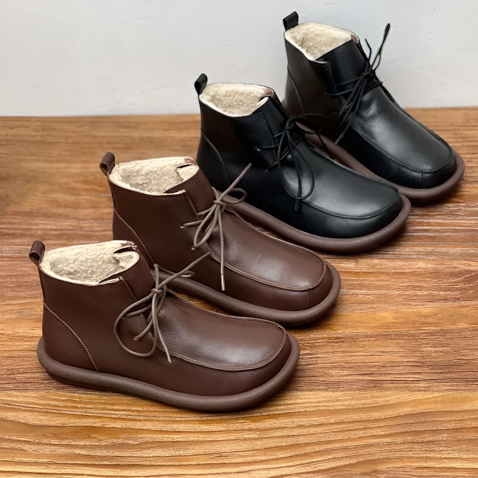 Women's cowhide casual boots with round toe and flat heel in black colour option