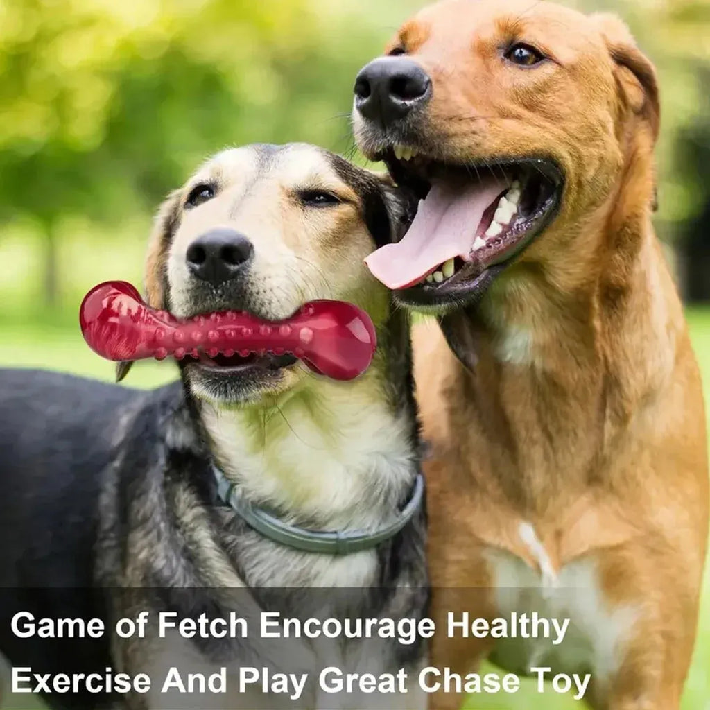 Red natural rubber chew toy for aggressive dogs measuring 4 inches in length