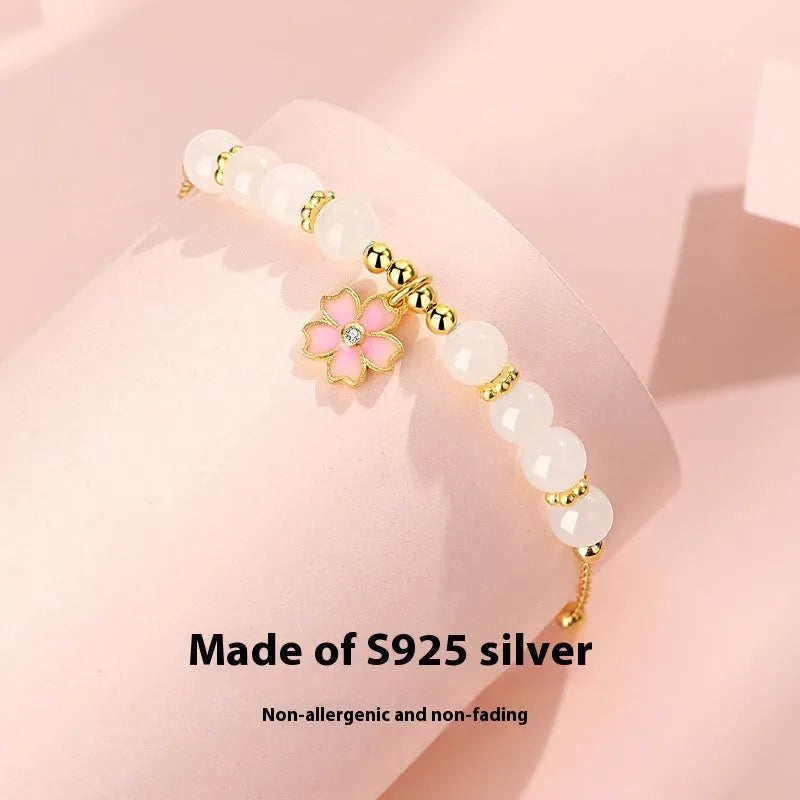 S925 silver cherry blossom pendant on Hetian jade beaded bracelet for women