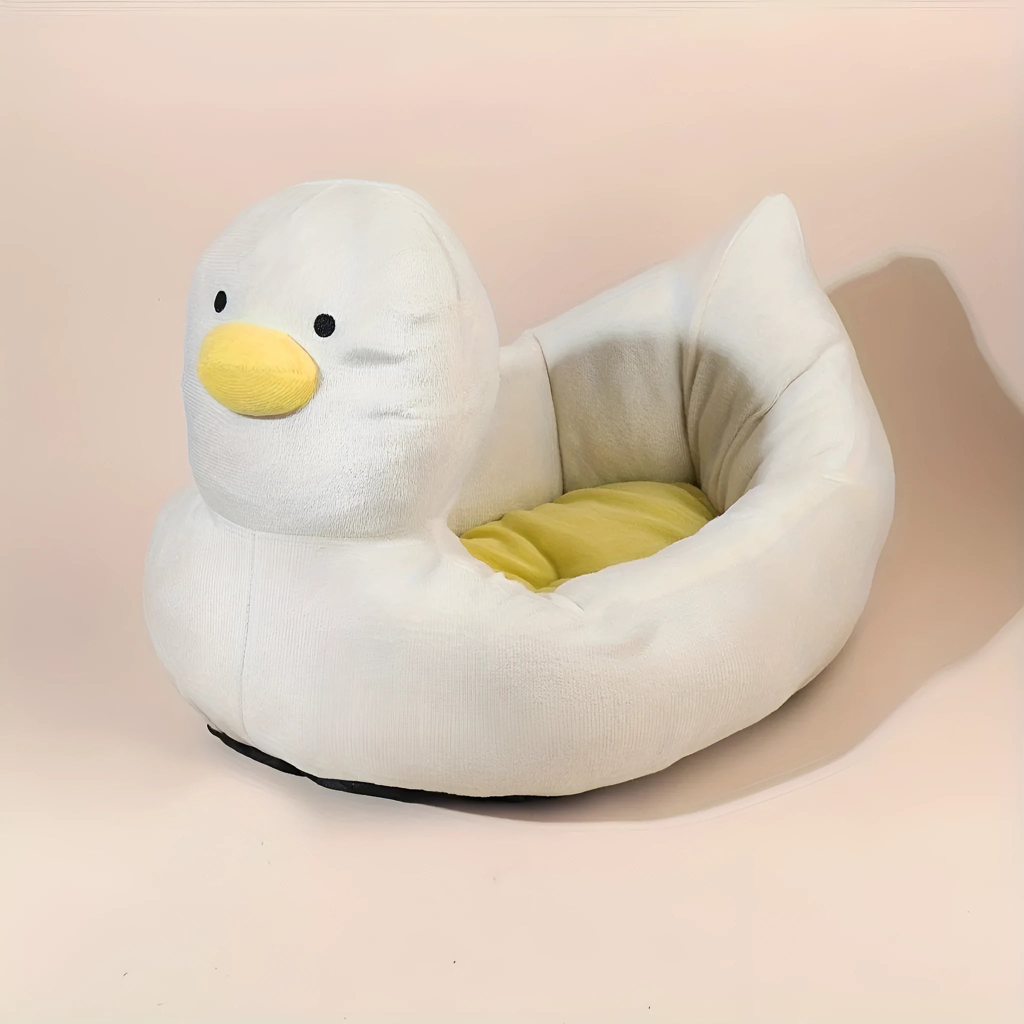 Blue duck-shaped pet bed sofa with soft polyester filling and raised edges