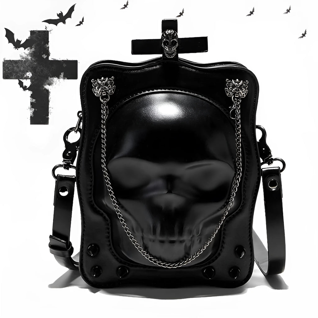 Black mini square messenger bag with a gothic embossed skull design, chain detail, and a crossbody strap.