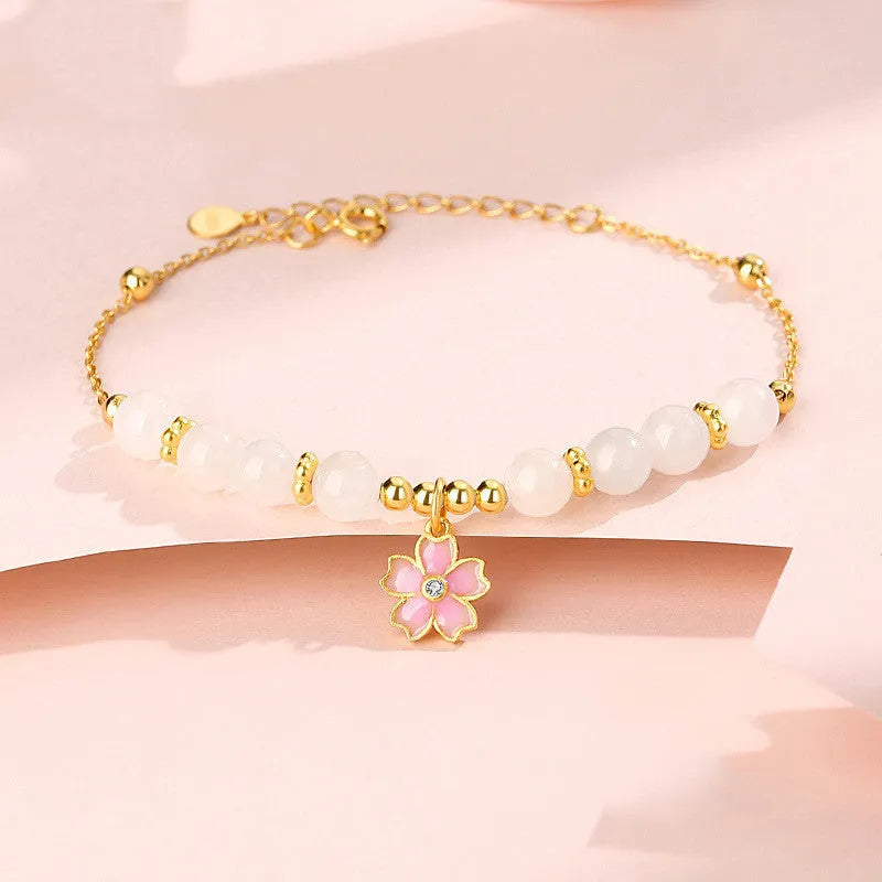 S925 silver cherry blossom pendant on Hetian jade beaded bracelet for women