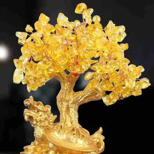 Resin Feng Shui ornament of a citrine small water turtle money tree, Chinese style.
