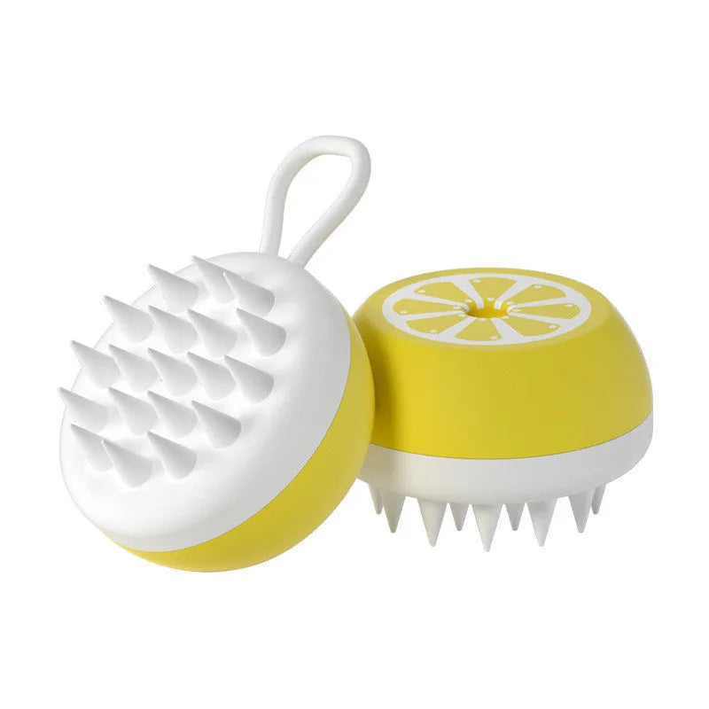 Yellow silicone pet bath brush with massage nodes and comb teeth for dogs and cats.