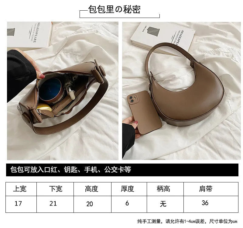 Retro dumpling-shaped black PU leather women's shoulder bag with a front sandwich pocket.