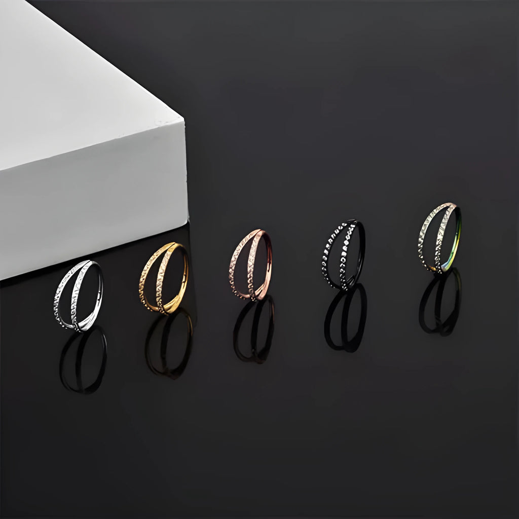 G23 titanium alloy nose ring with diamond finish in gold or steel colour, showing labret post design.