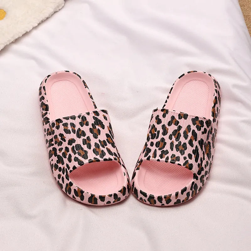 Women's leopard print EVA slippers with thick sole on a white background