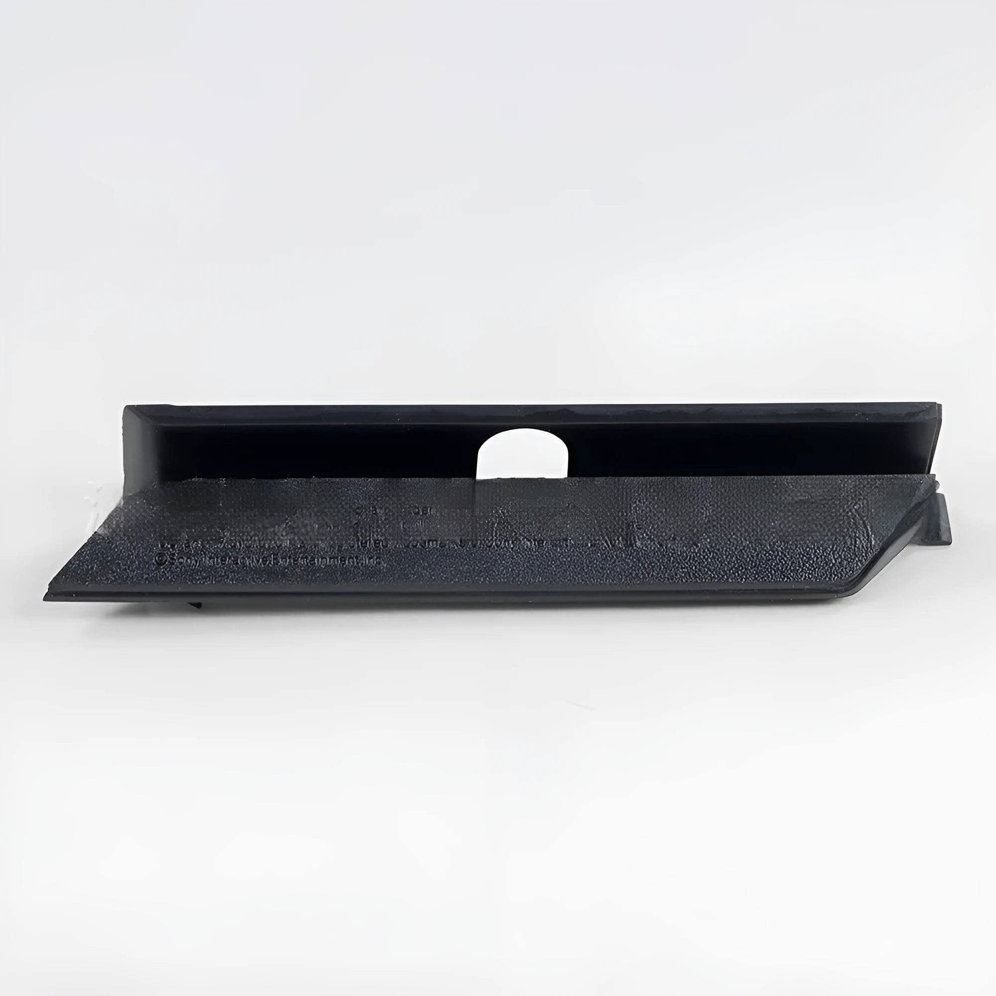 Black plastic hard drive cover for PC case airflow management as baffle bin component