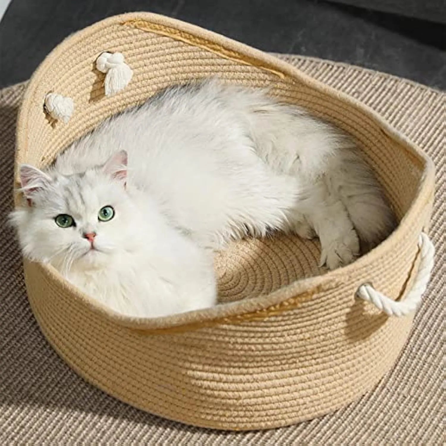 Wicker cat bed basket with built-in corrugated scratching board, shown in two available sizes for cats.