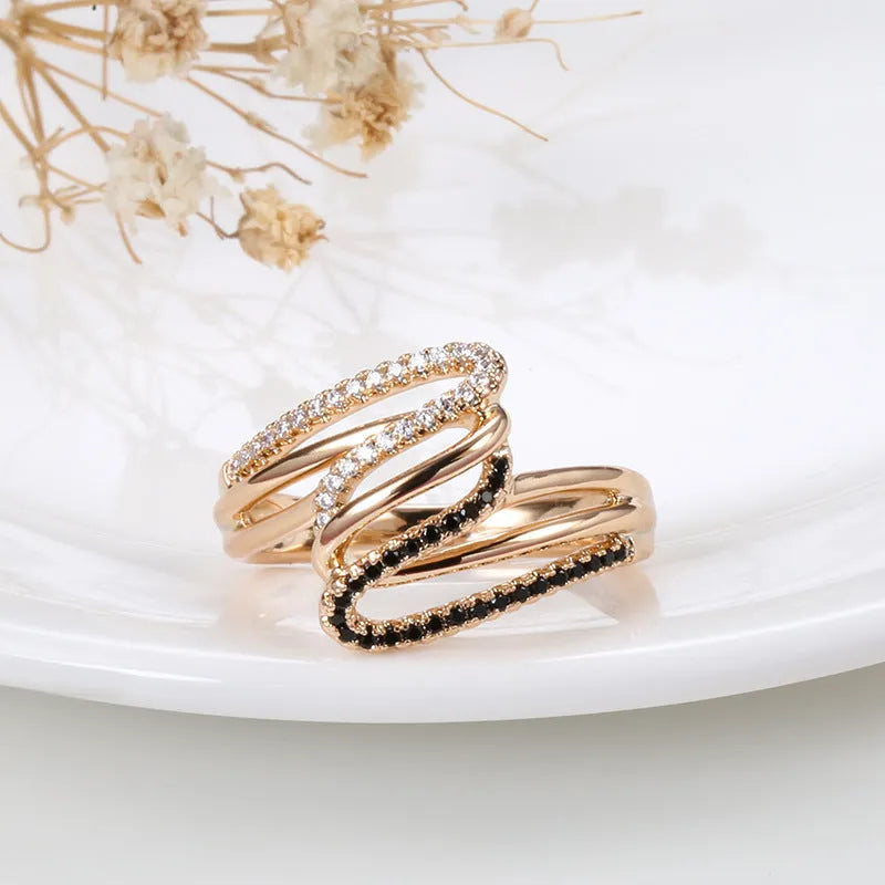 Close-up of a women's micro-inlaid zircon fashion ring in WK2230 colour on a copper base.