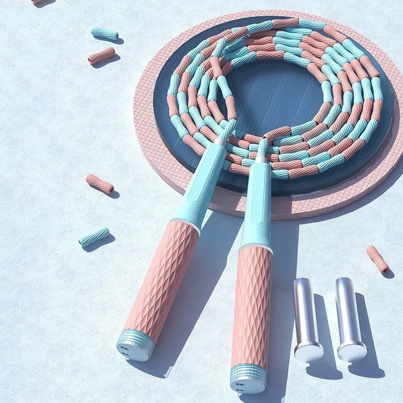 Children's skipping rope with soft bamboo beads in blue, green, pink, or purple colours