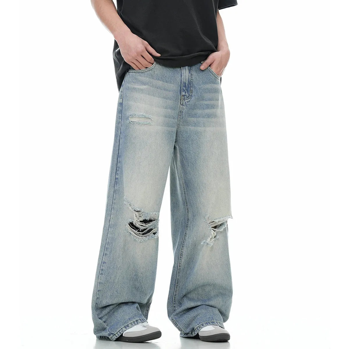 Man wearing blue retro-style distressed straight-leg cotton blend jeans.