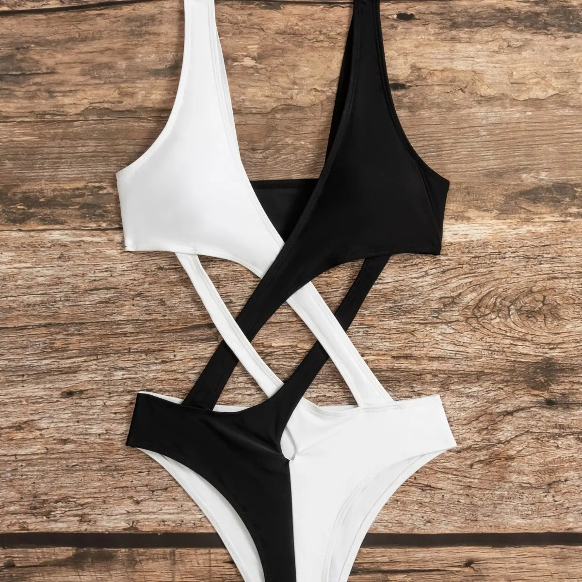 White women's one-piece swimsuit with colour block design and hollow out pattern