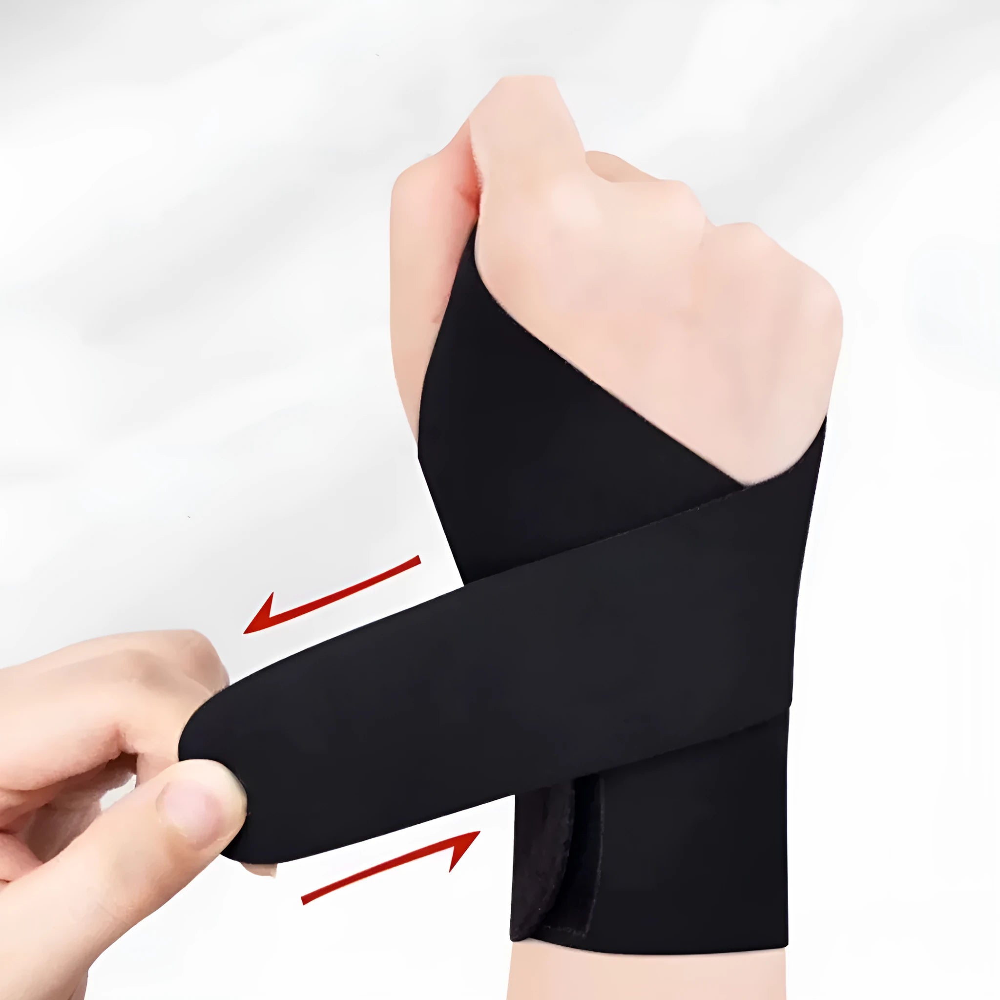 Adjustable athletic wristguard in black on a wrist, showing Velcro strap closure.