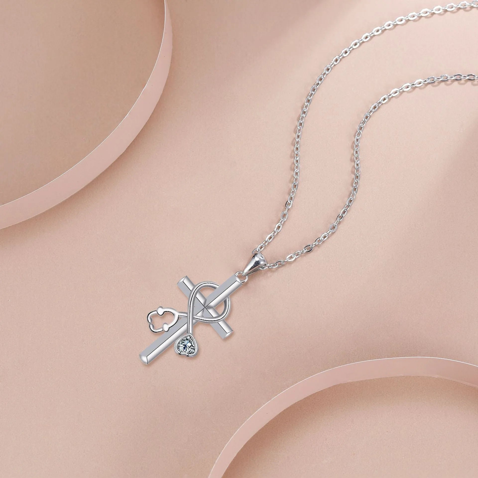 Women's cross stethoscope necklace with electroplated copper pendant and cross chain design