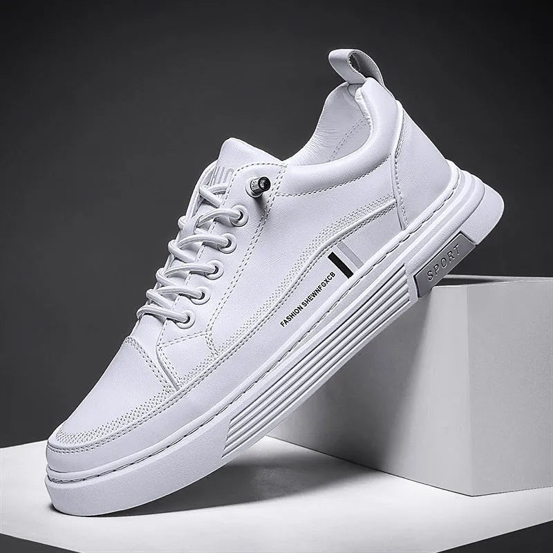 Men's low-top white skate shoes with elastic band fastening and a round toe, shown on a plain background.