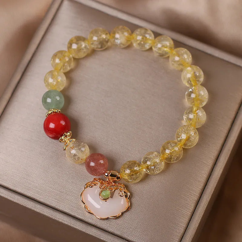 Women's citrine jade ruyi pendant bracelet with yellow crystal detail on alloy metal