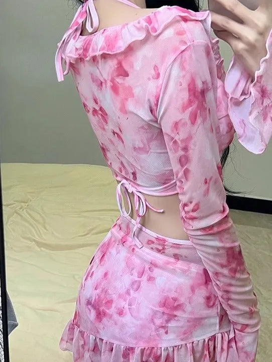Women's floral bikini swimsuit in cherry blossom pink on a mannequin