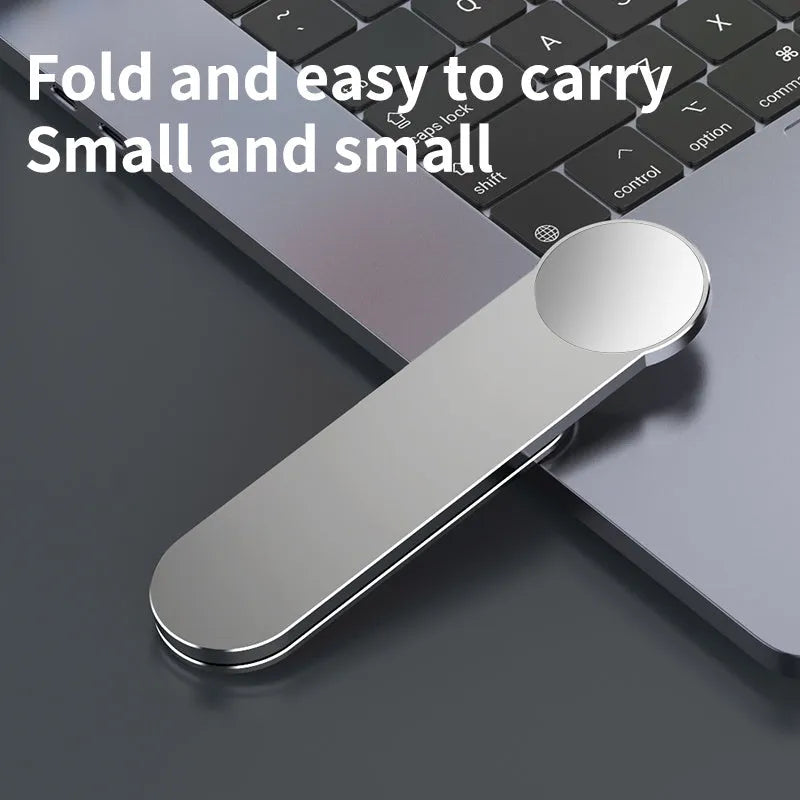 Silver aluminium alloy dual screen extension bracket with magnetic mobile phone holder on a desk.