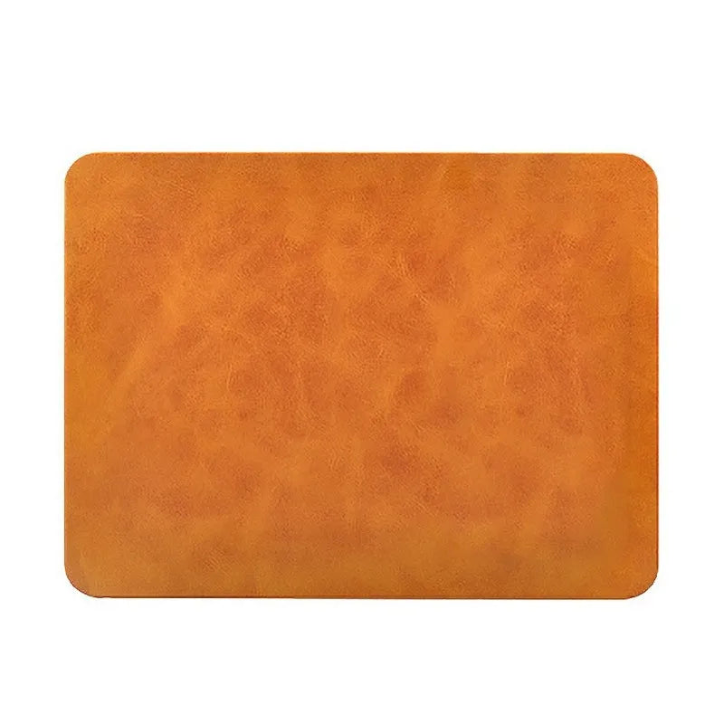 Brown leather-look mouse pad with integrated wireless fast charging area.