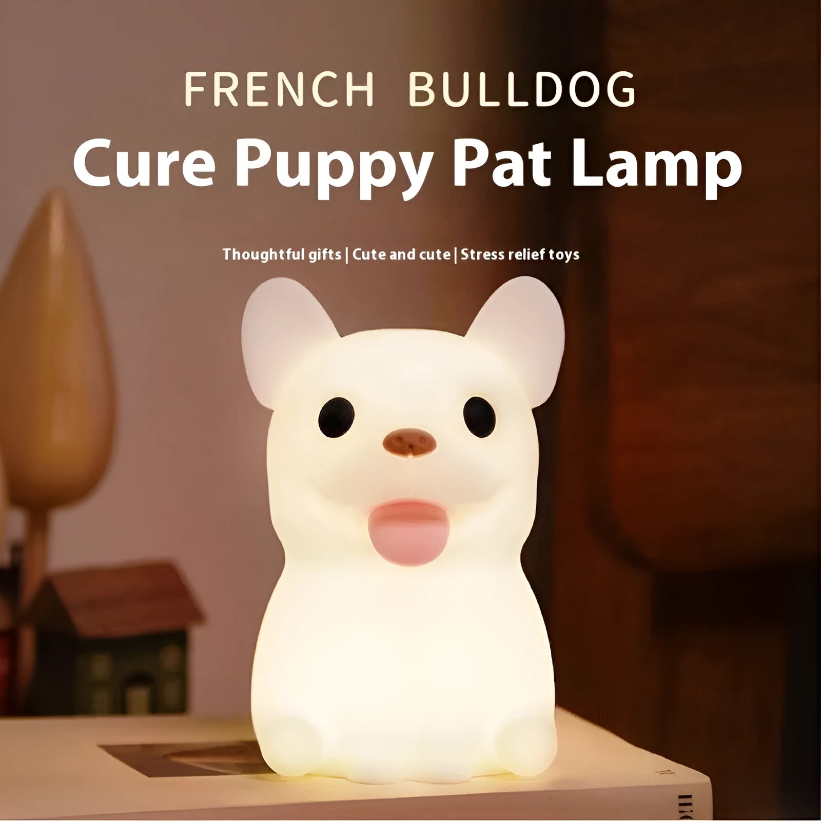 Silicone animal-shaped USB night light with touch dimming on a bedside table.