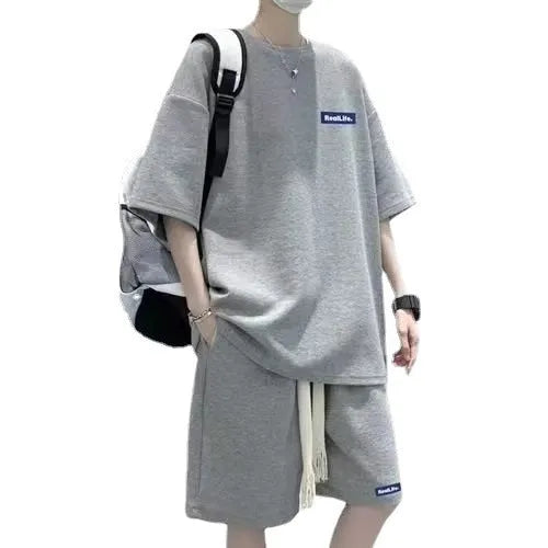 Waffle-textured leisure sports suit with short sleeve top and matching shorts in four colour options
