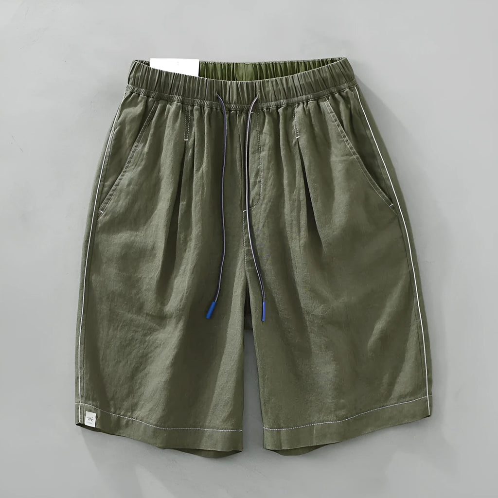 Men's linen shorts in straight drooping style with drawstring waist, shown in green and black colour options