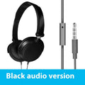 Black folding wired over-ear headphones with adjustable headband and 3.5mm plug on a coiled cable.