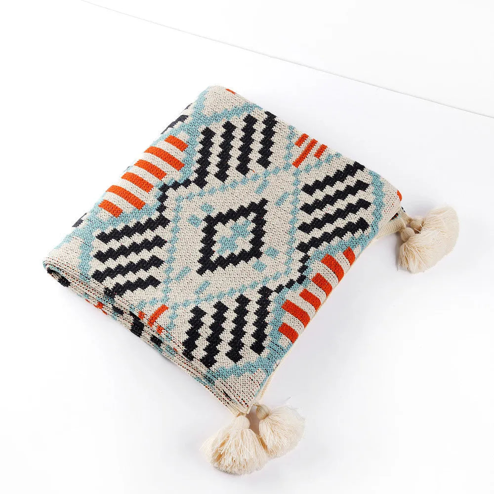Bohemian-style acrylic sofa blanket with tassel fringe in geometric pattern colour option
